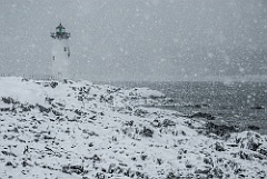 Portsmouth Lighthouse in Coastal Snowstorm